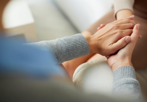Close-up,Of,Psychiatrist,Hands,Together,Holding,Palm,Of,Her,Patient Close-up,Of,Psychiatrist,Hands,Together,Holding,Palm,Of,Her,Patient